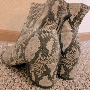 Snakeskin heeled boots